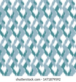 Ikat geometric seamless texture. Abstract background.