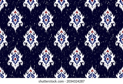 Ikat indian ethnic pattern design.  Aztec fabric native tribal boho carpet textile decoration wallpaper.  Traditional embroidery vector illustrations background.  
