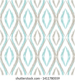 Ikat ogee seamless vector pattern design. Ethnic fabric print geometric ikat pattern. Cool ogee seamless repeating background. Tribal motifs ikat textile print design. Fashion ornament.