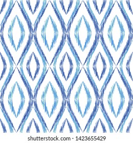 Ikat ogee seamless vector pattern design. Ethnic fabric print geometric ikat pattern. Minimal ogee seamless repeating background. Tribal motifs ikat textile print design. Indian ornament.