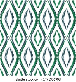 Ikat ogee seamless vector pattern design. Ethnic fabric print geometric ikat pattern. Modern ogee seamless repeating background. Tribal motifs ikat textile print design. Pillow ornament.