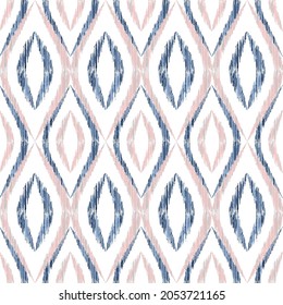 Ikat ogee seamless vector pattern illustration. Ethnic fabric print geometric ikat pattern. Simple ogee seamless repeating background. Tribal motifs ikat textile print design. Indian ornament.