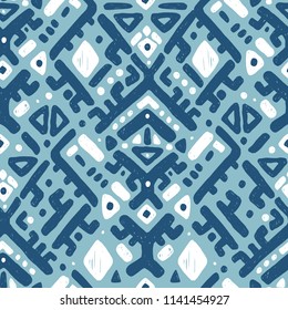 Ikat ornament. Tribal pattern in Aztec style. Hand Drawn folklore seamless pattern