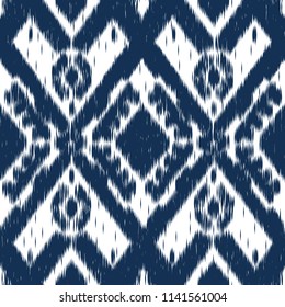 Ikat ornament. Tribal pattern in Aztec style. Hand Drawn folklore seamless pattern