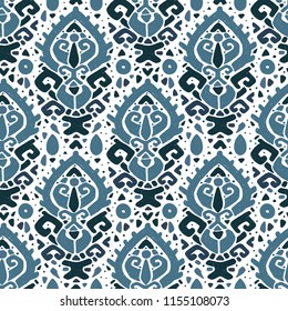 Ikat ornament. Tribal pattern in Aztec style. Hand Drawn folklore seamless pattern. Can be used for wallpaper, website background, textile, phone case print