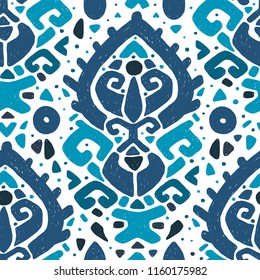 Ikat ornament. Tribal pattern in Aztec style. Hand Drawn folklore seamless pattern. For your textile, phone case, web background, wallpaper, wrapping paper