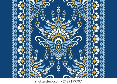 Ikat paisley design pattern on blue background vector illustration.Ikat ethnic oriental embroidery traditional.Aztec style,abstract background.design for texture,fabric,clothing,decoration,print,scarf