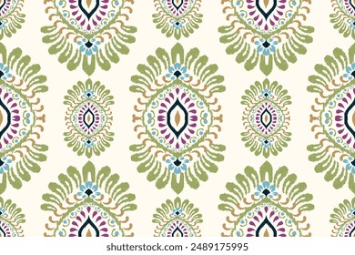 Ikat paisley design seamless pattern on white background vector illustration.Ikat ethnic oriental embroidery traditional.Aztec style,abstract background.design for texture,fabric,clothing,decoration