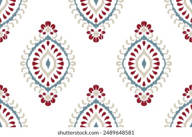 Ikat paisley design seamless pattern on white background vector illustration.Ikat ethnic oriental embroidery traditional.Aztec style,abstract background.design for texture,fabric,clothing,decoration