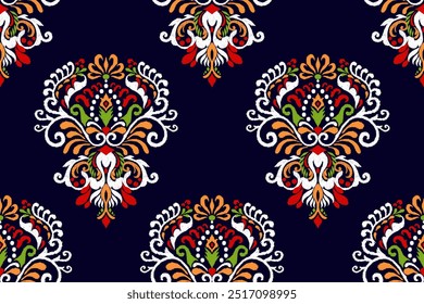 Ikat paisley design seamless pattern on black background vector illustration.Ikat ethnic oriental embroidery traditional.Aztec style,abstract background.design for texture,fabric,clothing,print,saree