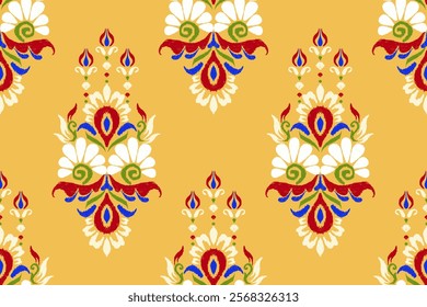 Ikat paisley design seamless pattern on orange background vector illustration.Ikat ethnic oriental embroidery traditional.Aztec style,abstract background.design for texture,fabric,clothing,decoration.