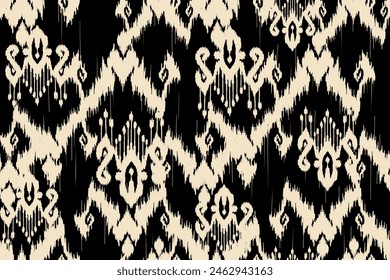 Ikat paisley embroidery on the fabric in Indonesia,India and asian countries.geometric ethnic oriental seamless pattern.Aztec style. illustration.design for texture,fabric,clothing,wrapping,textile