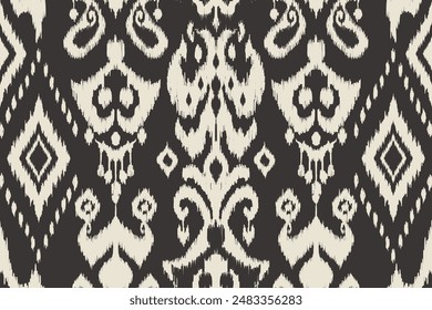 Ikat paisley embroidery on the fabric in Indonesia,India and asian countries.geometric ethnic oriental seamless pattern.Aztec style. illustration.design for texture,fabric,clothing,wrapping,carpet