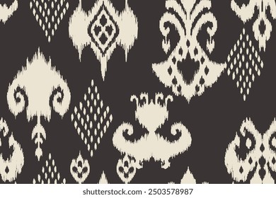 Ikat paisley embroidery on the fabric in Indonesia,India and asian countries.geometric ethnic oriental seamless pattern.Aztec style. illustration.design for texture,fabric,clothing,wrapping,carpet