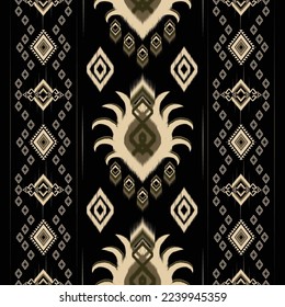 Ikat paisley. Geometric ethnic pattern oriental African American Pakistan,Asia,Aztec motif textile and bohemian.design for background, wallpaper,carpet print, fabric, batik,tile. Ikat pattern vector. 
