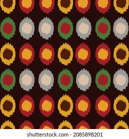 Tela de patrón de ikat - tejido nacional de los países de Asia Central. Industria de la moda. Fondo colorido. 