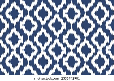 Ikat pattern . Geometric chevron abstract illustration, wallpaper. Tribal ethnic vector texture. Aztec style. Folk embroidery. Indian, Scandinavian, African rug.design for carpet,sarong  

