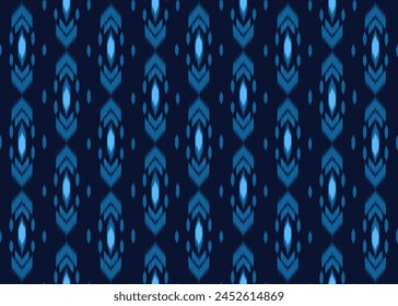 Ikat pattern on navy blue background.Blue arrows pattern.Chevron pattern.Zigzag.Geometric shape.DIgital design.Ethnic.Illustration.Modern.Design for rug.Clothes.Dress.Carpet.Printing.Tablecloth.Knit