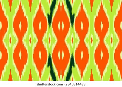 Ikat pattern in orange and green ethnic pattern. Traditional folk antique ornate elegant luxury background. Print design for fabric texture textile wallpaper background backdrop.