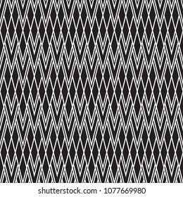 Ikat pattern. Seamless design. Vector background with tribal triangles. Ethnic fashion stripes.