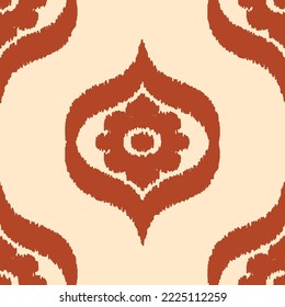 Ikat pattern silk fabric - traditional textile product in Uzbekistan, Central Asia. Orange and white