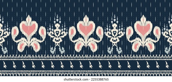 Ikat pattern vector embroidery on blue background.geometric ethnic oriental seamless pattern traditional.Aztec style abstract vector.design for texture,fabric,clothing,saree,decoration,sari.