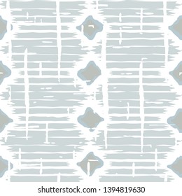 Ikat pattern vector. Geometric background with ethnic rug fabric texture and chevron shapes in neutral pastel colors.
