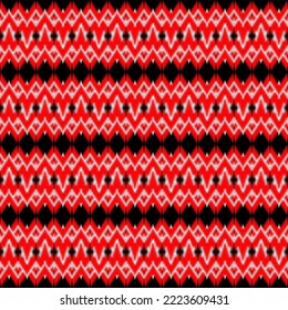 Ikat pattern.Abstract ethnic fabric pattern.Red and white geometric tribal pattern.Black background zigzag pattern.Illustration of embroidery,carpet design, wallpaper,clothing,wrapping,knitwear