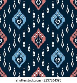 Ikat pixel paisley ethnic seamless pattern decoration design. Aztec fabric carpet boho mandalas textile decor wallpaper. Tribal native motif ornaments African American folk traditional embroidery vect