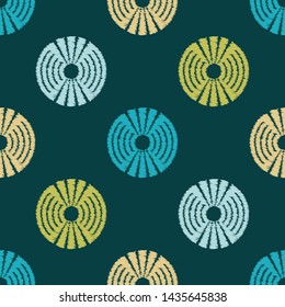 Ikat. Polka dots seamless pattern. Multicolored. Ethnic print. Boho. Simple design. Vector geometric background. Can be used in printing, textile, wrapping, web-design.