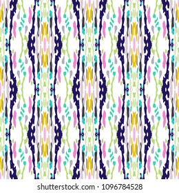 Ikat print in modern style, shibori fabric design. Tribal ethnic seamless pattern. Vintage endless repeat ornament. Traditional folk ikat texture. Vector watercolor paint splash background.