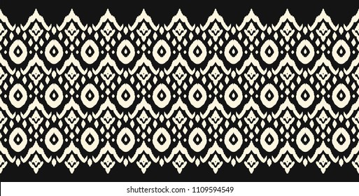 Ikat seamless border print. Vector tie dye shibori pattern with stripes and chevron. Ink textured japanese background. Ethnic fabric vector. Bohemian fashion. Endless watercolor texture. African rug.