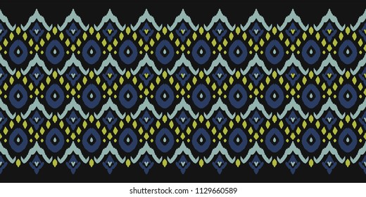 Ikat seamless border print. Vector tie dye shibori pattern with stripes and chevron. Ink textured japanese background. Ethnic fabric vector. Bohemian fashion. Endless watercolor texture. African rug.