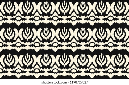Ikat seamless border print. Vector tie dye shibori pattern with stripes and chevron. Ink textured japanese background. Ethnic fabric vector. Bohemian fashion. Endless watercolor texture. African rug.