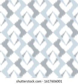 Ikat  seamless colorful  geometric pattern. Abstract background texture.