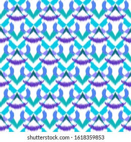 Ikat  seamless colorful  geometric pattern. Abstract background texture.