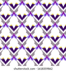 Ikat  seamless colorful  geometric pattern. Abstract background texture.