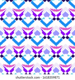 Ikat  seamless colorful  geometric pattern. Abstract background texture.