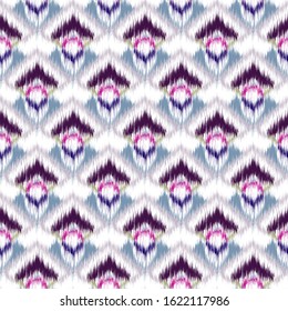 Ikat seamless colorful  geometric pattern. Abstract background texture.