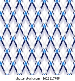 Ikat seamless colorful  geometric pattern. Abstract background texture.