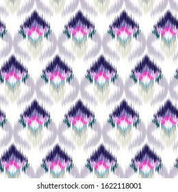 Ikat seamless colorful  geometric pattern. Abstract background texture.