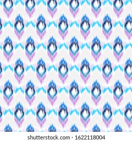 Ikat seamless colorful  geometric pattern. Abstract background texture.