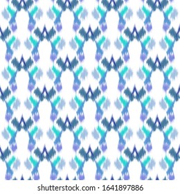 Ikat seamless colorful  geometric pattern. Abstract background texture.