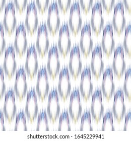 Ikat seamless colorful  geometric pattern. Abstract background texture.