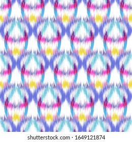 Ikat seamless colorful  geometric pattern. Abstract background texture.