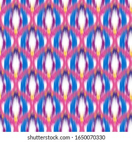 Ikat seamless colorful  geometric pattern. Abstract background texture.