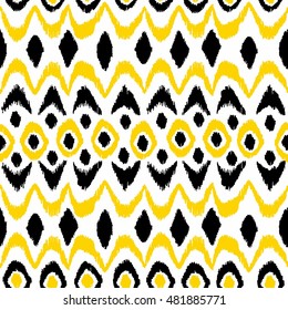 Ikat seamless damask pattern. Black and yellow elements on a white background. Handmade. Print for your textile. Vector illustration.