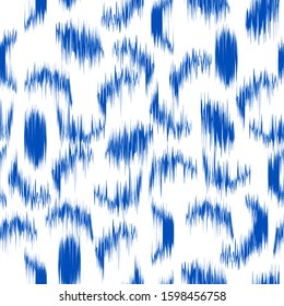 Ikat seamless geometric pattern. Abstract graphic background texture.