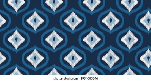 Ikat seamless ogee vector pattern. Aztec tribal abstract modern textile print. Damask style background with stripes and chevron. Ethnic watercolor fabric. Boho geometric fashion design.