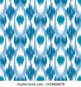 Ikat seamless pattern. Abstract background.